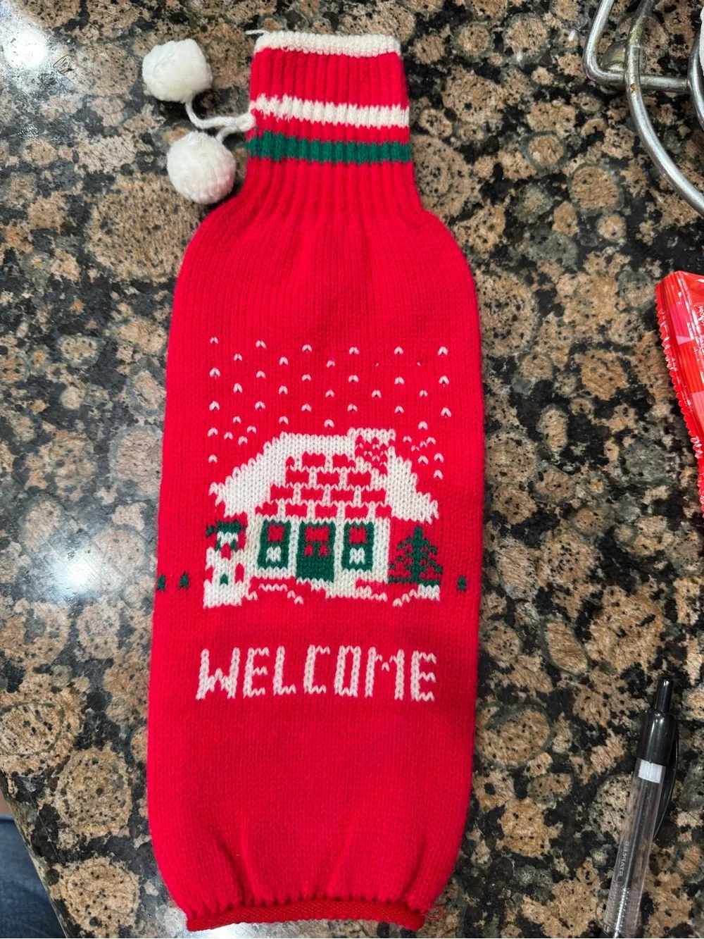 Festive Red 'Welcome' Holiday Knit Bottle Cover with Pom-Poms